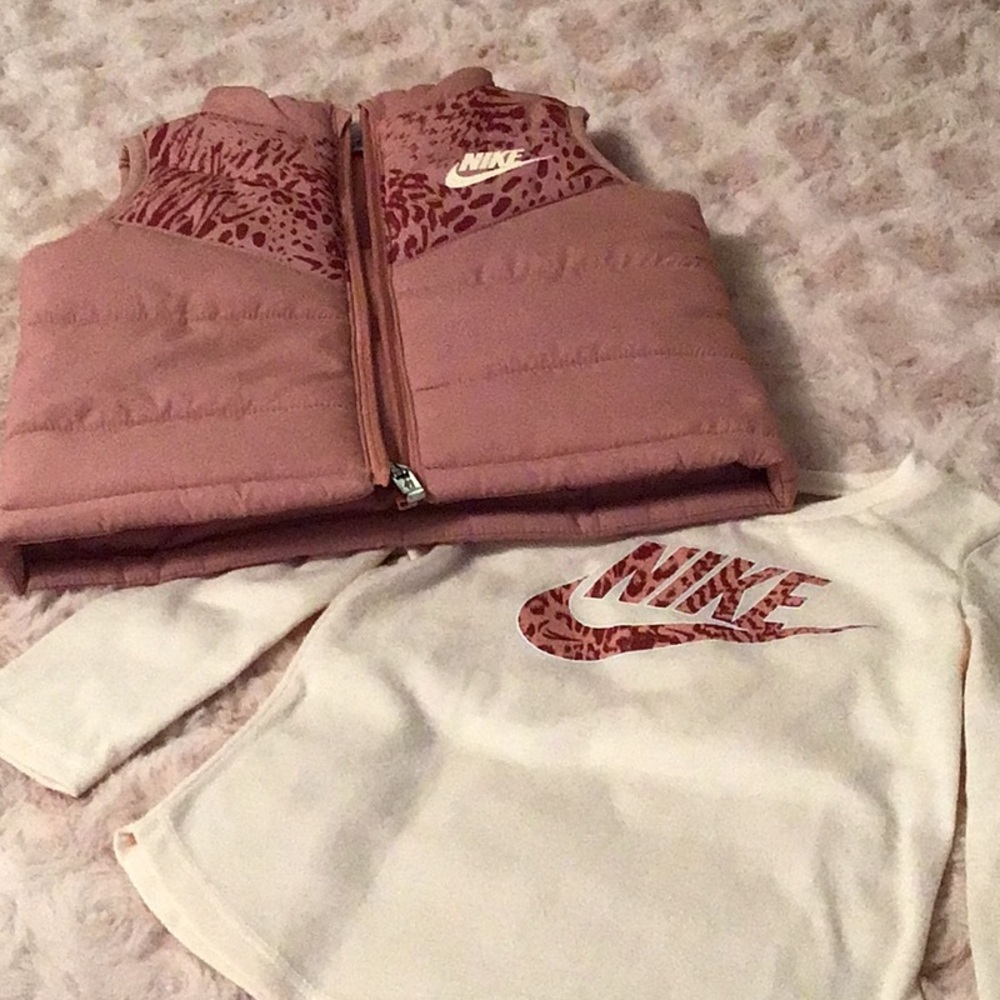 Nike quilted sleeveless puffer vest with a Nike T-shirt